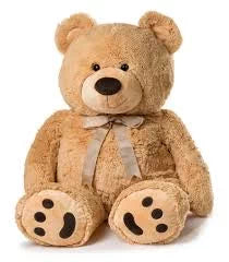 Plush teddy bear with a ribbon bow